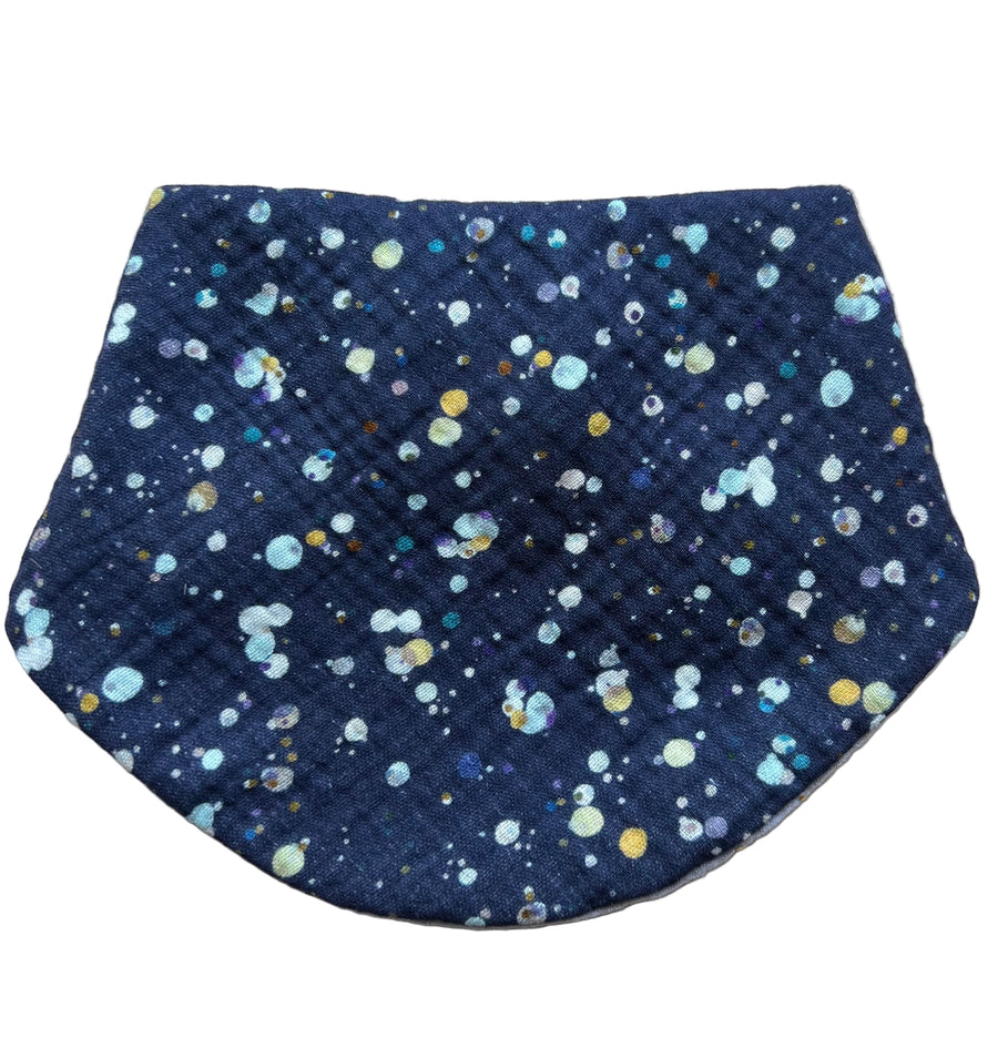 Navy blue fabric with colorful dot pattern on a white background
